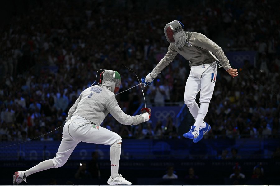 Iran's Ali Pakdaman competes against France's Sebastien Patrice in the men's sabre