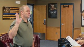 Timothy Brennan was sworn in with the Milford Police Department on Monday.