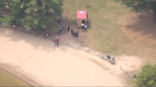 An ambulance at a Lake Cochituate beach on Monday, July 22, 2024.