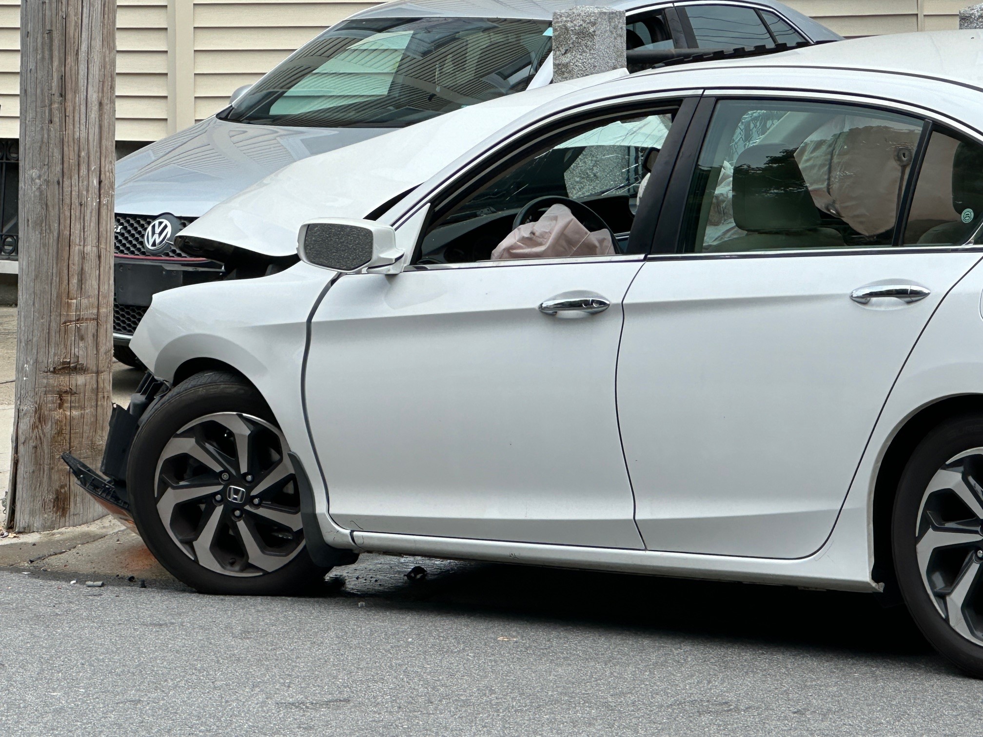 A crashed car being investigated by police in Revere, Massachusetts, on Tuesday, July 9, 2024.