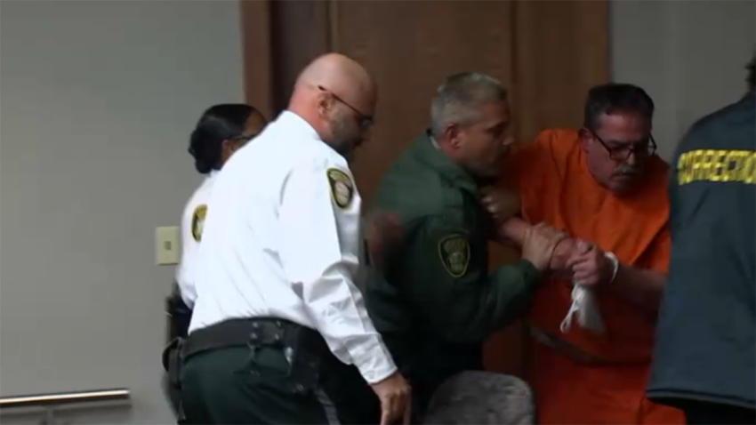 Omar Rodriguez is removed from court on Aug. 15, 2024.