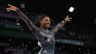 Simone Biles of Team USA reacts after competing on the vault during the Artistic Gymnastics Women’s Qualification on day two of the 2024 Paris Olympics at Bercy Arena in Paris on July 28, 2024.