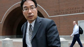 FILE - In this Sept. 19, 2017, file photo, Glenn Chin, supervisory pharmacist at the now-closed New England Compounding Center, leaves federal court in Boston.