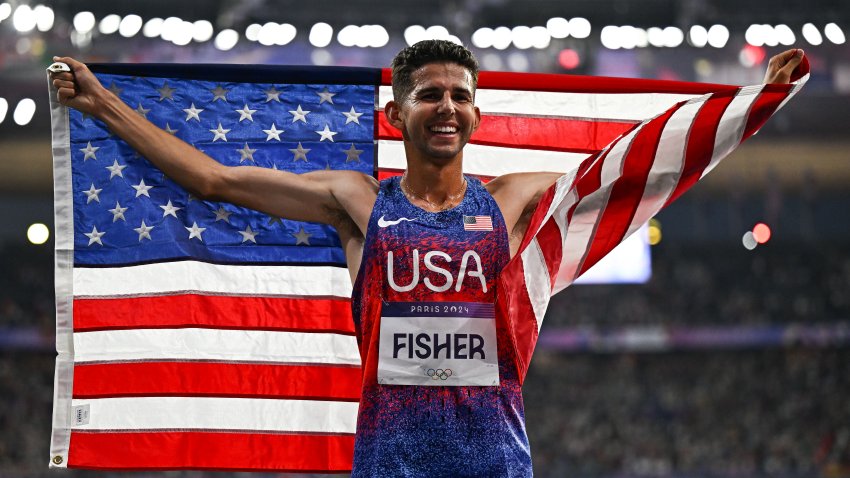 Paris , France – 2 August 2024; Grant Fisher of Team USA celebrates after winning bronze in the men’s 10,000m final at the Stade de France during the 2024 Paris Summer Olympic Games in Paris, France. (Photo By Sam Barnes/Sportsfile via Getty Images)