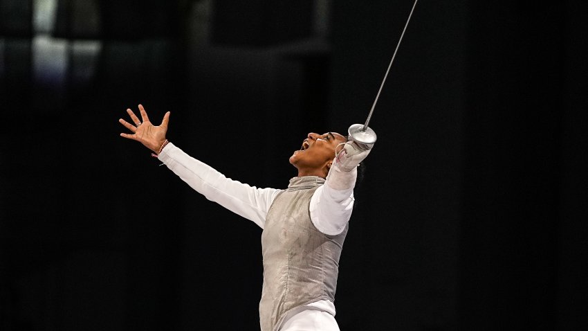 Lauren Scruggs of USA celebrates after winning against Arianna Errigo of Italy during the Women’s Foil Team Gold Medal Match Bout between Team Italy and Team United States during the Paris 2024 Olympic Games at the Grand Palais in Paris, on August 01, 2024.