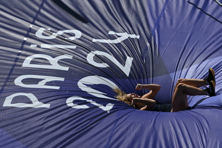 Britain's Molly Caudery reacts as she competes in the women's pole vault qualification of the athletics event at the Paris 2024 Olympic Games at Stade de France in Saint-Denis, north of Paris, on August 5, 2024