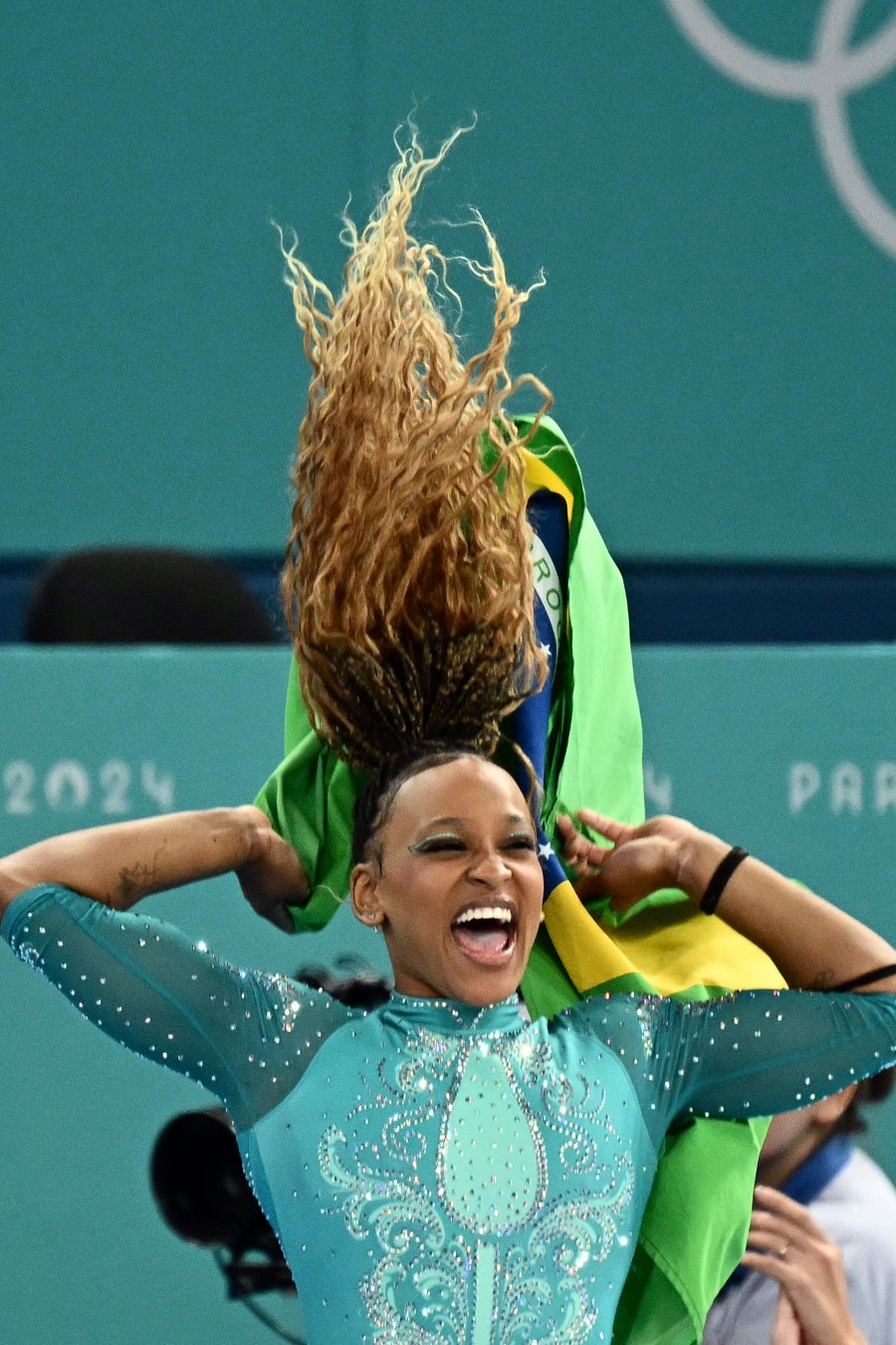 Brazil's Rebeca Andrade celebrates winning the gold medal at the end of the artistic gymnastics women's floor exercise final during the Paris 2024 Olympic Games at the Bercy Arena in Paris, on August 5, 2024