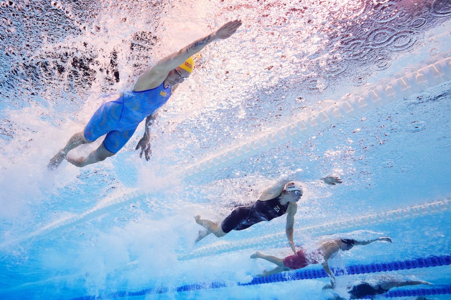 Sarah Sjoestroem of Team Sweden and Gretchen Walsh of Team United States compete in the Women's 50m Freestyle Heats