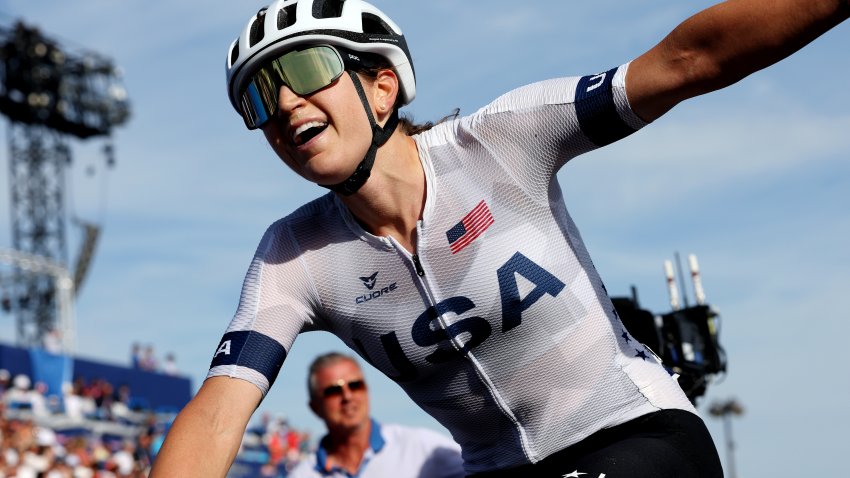 Kristen Faulkner of Team United States celebrates at finish line as Gold medal winner during the Women’s Road Race on day nine of the Olympic Games Paris 2024 at Trocadero on August 04, 2024 in Paris, France.