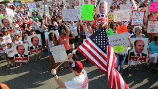 Employees and customers hold a rally in support of Arthur T. Demoulas and Market Basket.