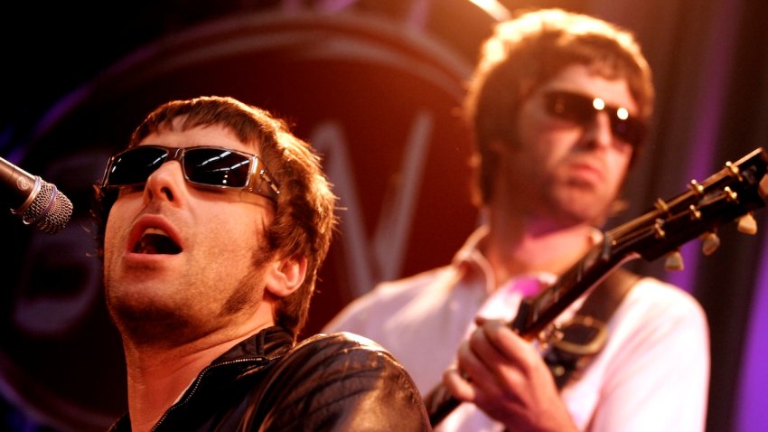 FILE – Liam Gallagher and Noel Gallagher performing live onstage.