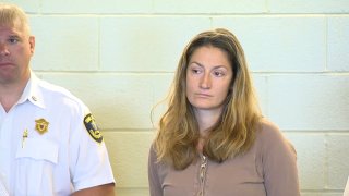 Kristina Blackmore appears in court in 2019 after her arrest in a deadly hit-and-run crash in Duxbury