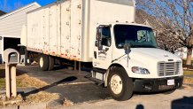 A moving truck outside a home