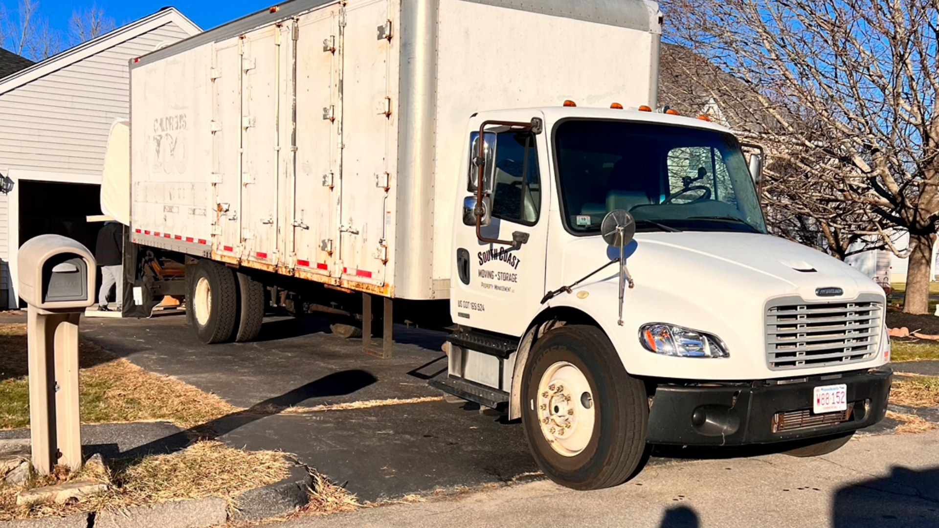 A moving truck outside a home