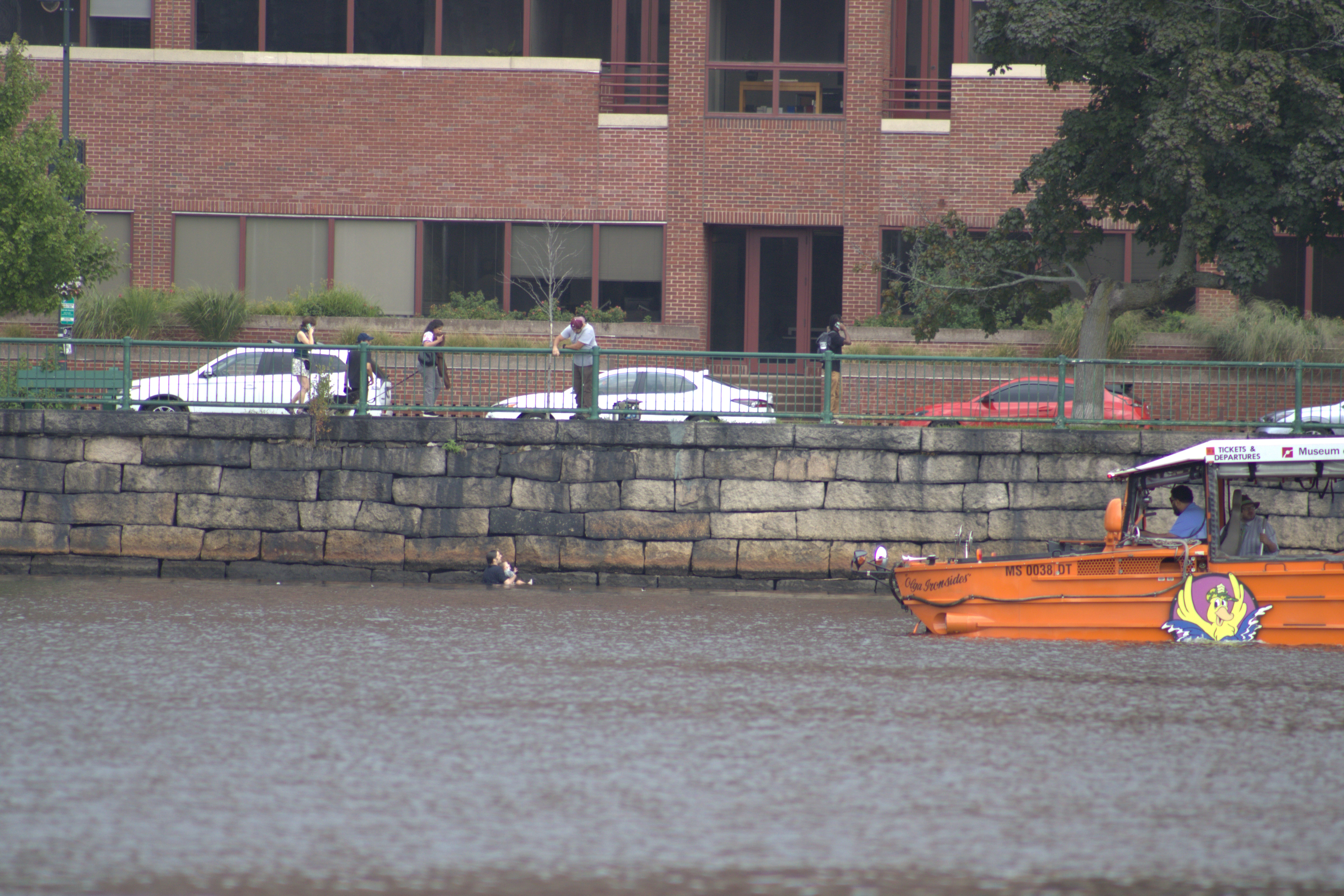 A man and his toddler in the Charles River as they were being rescued by a duck boat on Monday, Aug. 19, 2024.