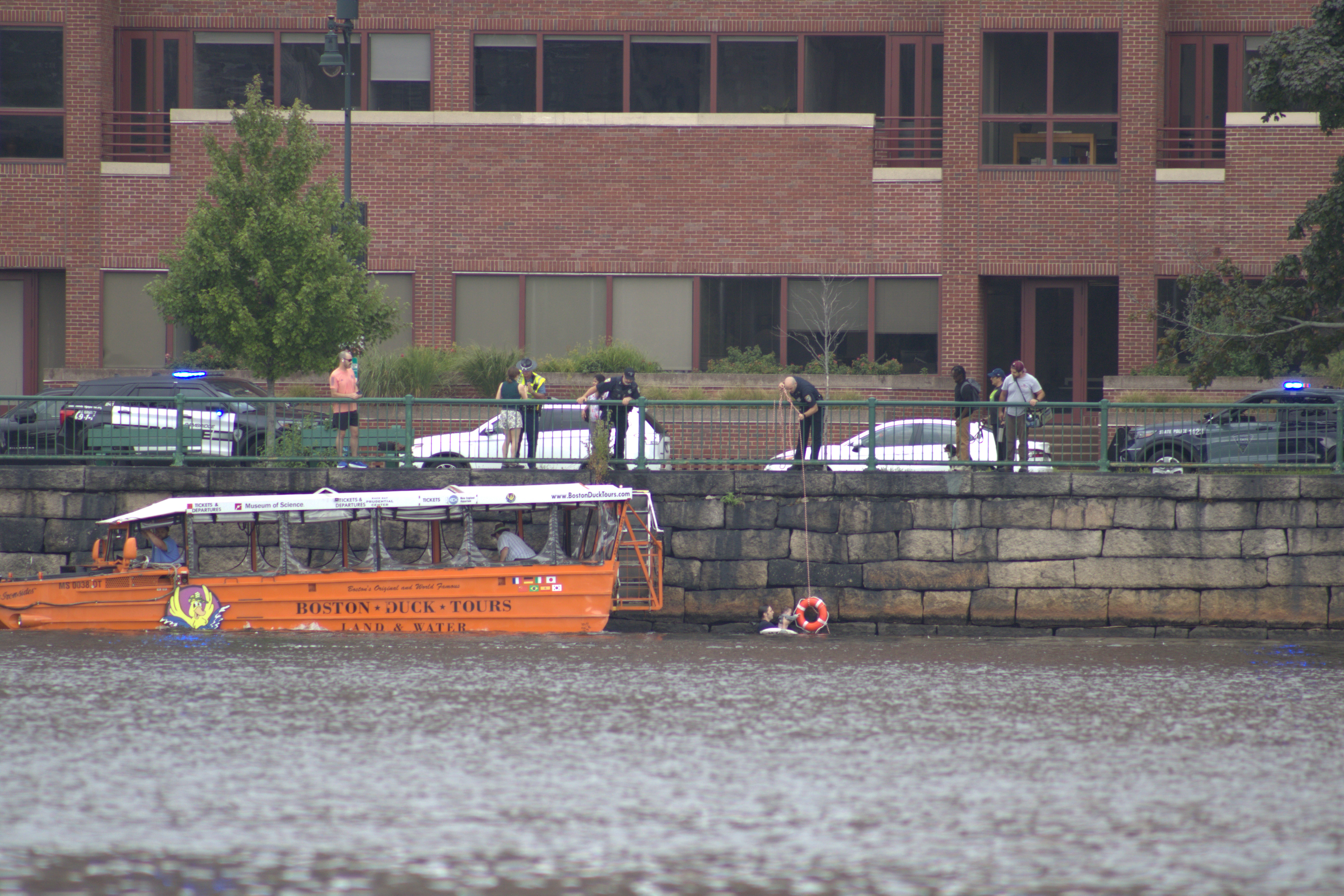 A man and his toddler in the Charles River as they were being rescued by a duck boat on Monday, Aug. 19, 2024.