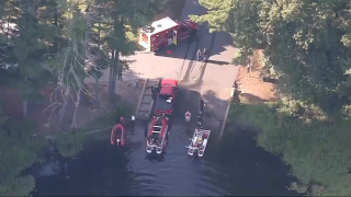 First responders at Whitehall Reservoir in Hopkinton, Massachusetts, on Thursday, Aug. 22, 2024.