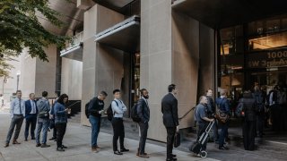 Attorneys line up to enter a courthouse in Portland, Oregon, for a hearing in the FTC’s lawsuit to block Kroger’s acquisition of Shaw’s and Star Market owner Albertsons.