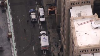 First responders at the scene of a fatal fall on Tremont Street in Boston's Theater District on Friday, Aug. 9, 2024.