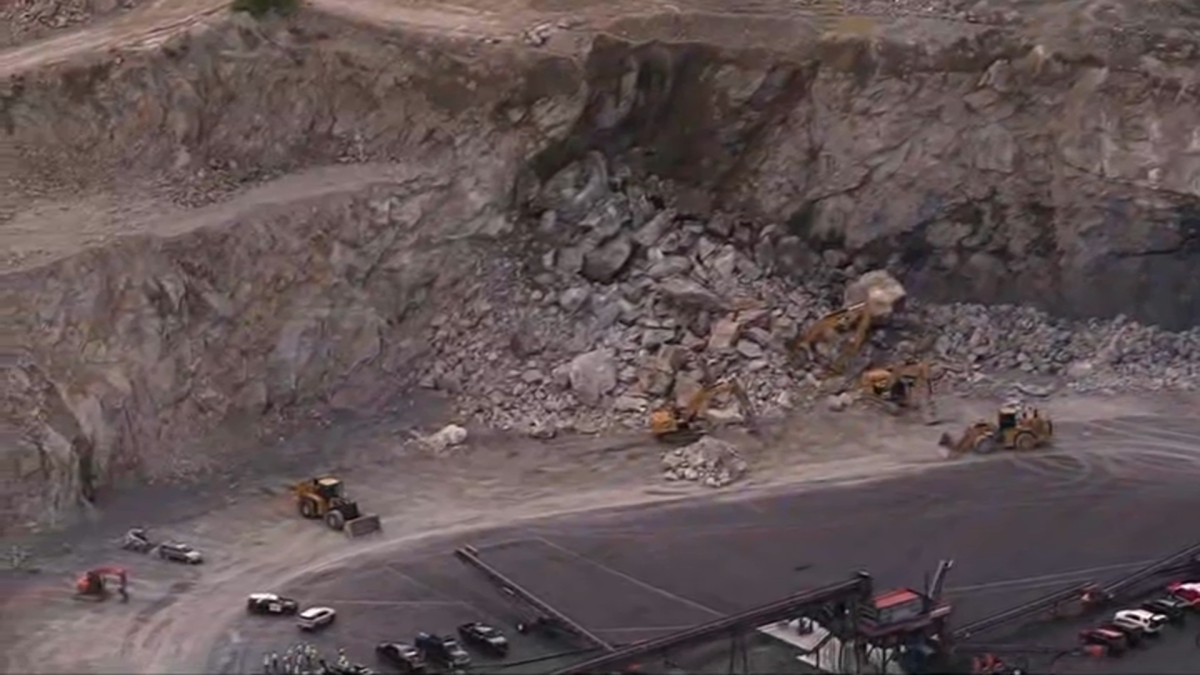 Rocks on excavator, city stops work – NBC Boston