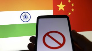 Indian flag and Chinese flag displayed on screen.