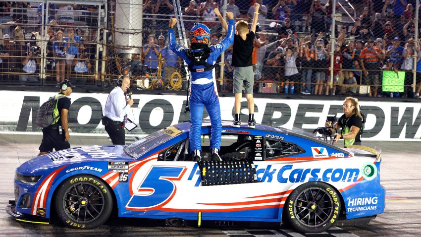 Kyle Larson celebrates with his son Owen