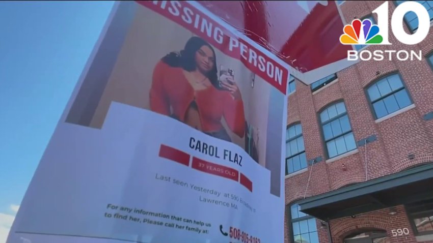 Neighbor charged in connection with Lawrence woman's death