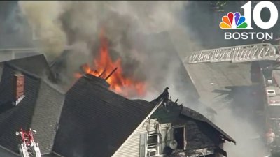 11 firefighters injured battling Lowell blaze