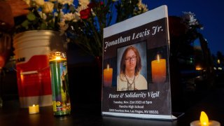 A memorial for Jonathan Lewis Jr. is set up in an alleyway near Rancho High School in eastern Las Vegas,