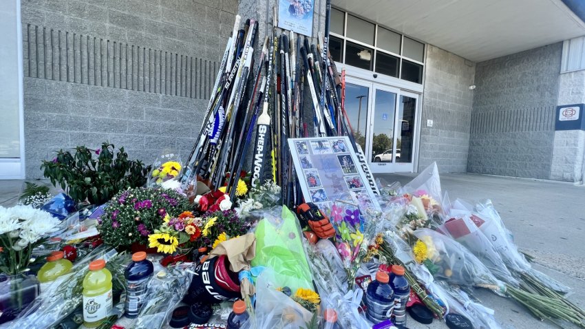 A growing memorial outside Hollydell Ice Arena in Sewell, NJ honoring Johnny and Matty Gaudreau.