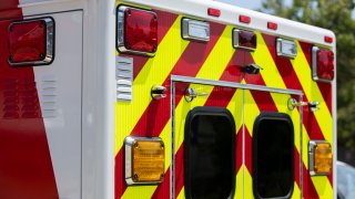 Daytime detailed view of the back of an ambulance.