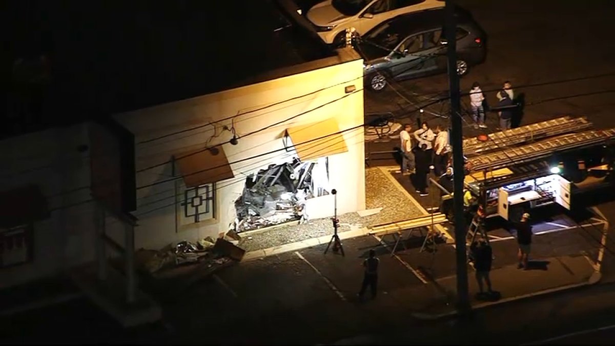 Quincy MA car into liquor store NBC Boston