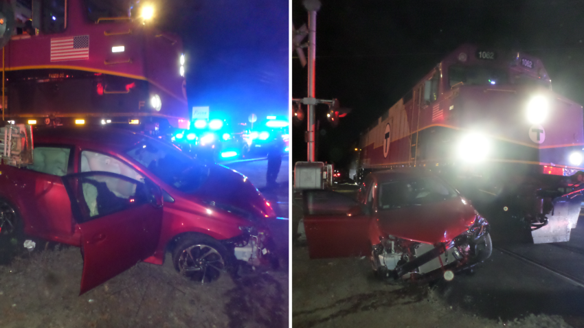 A car that was hit by an MBTA Commuter Train in Stoughton, Massachusetts, after a teenage drive got stuck on the tracks Thursday, Sept. 12, 2024.