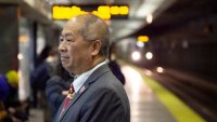 MBTA General Manager Phil Eng waits on a North Station platform.