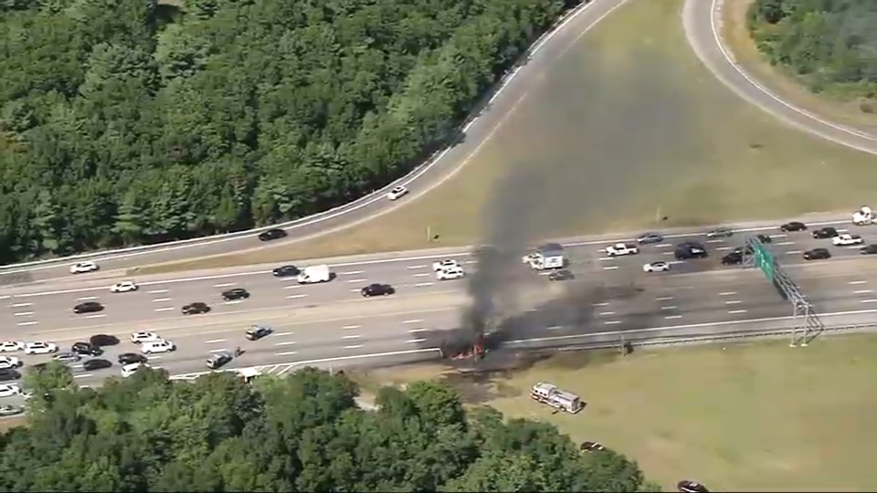 Smoke rising from a truck fire on I-93 in Canton, Massachusetts, on Tuesday, Sept. 3, 2024.