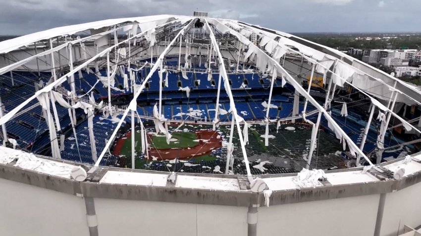 A shredded roof of Tropicana Field after Hurricane Milton