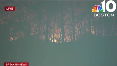 Brush fire burning in Salem, sending smoke into the sky