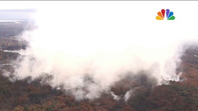 Persistent brush fires burning in Mass. | What's trapping the smoke, smell