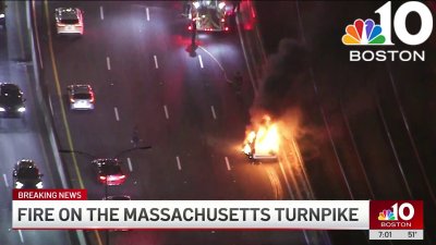 Heavy flames pour from van on Mass. Pike in Fenway