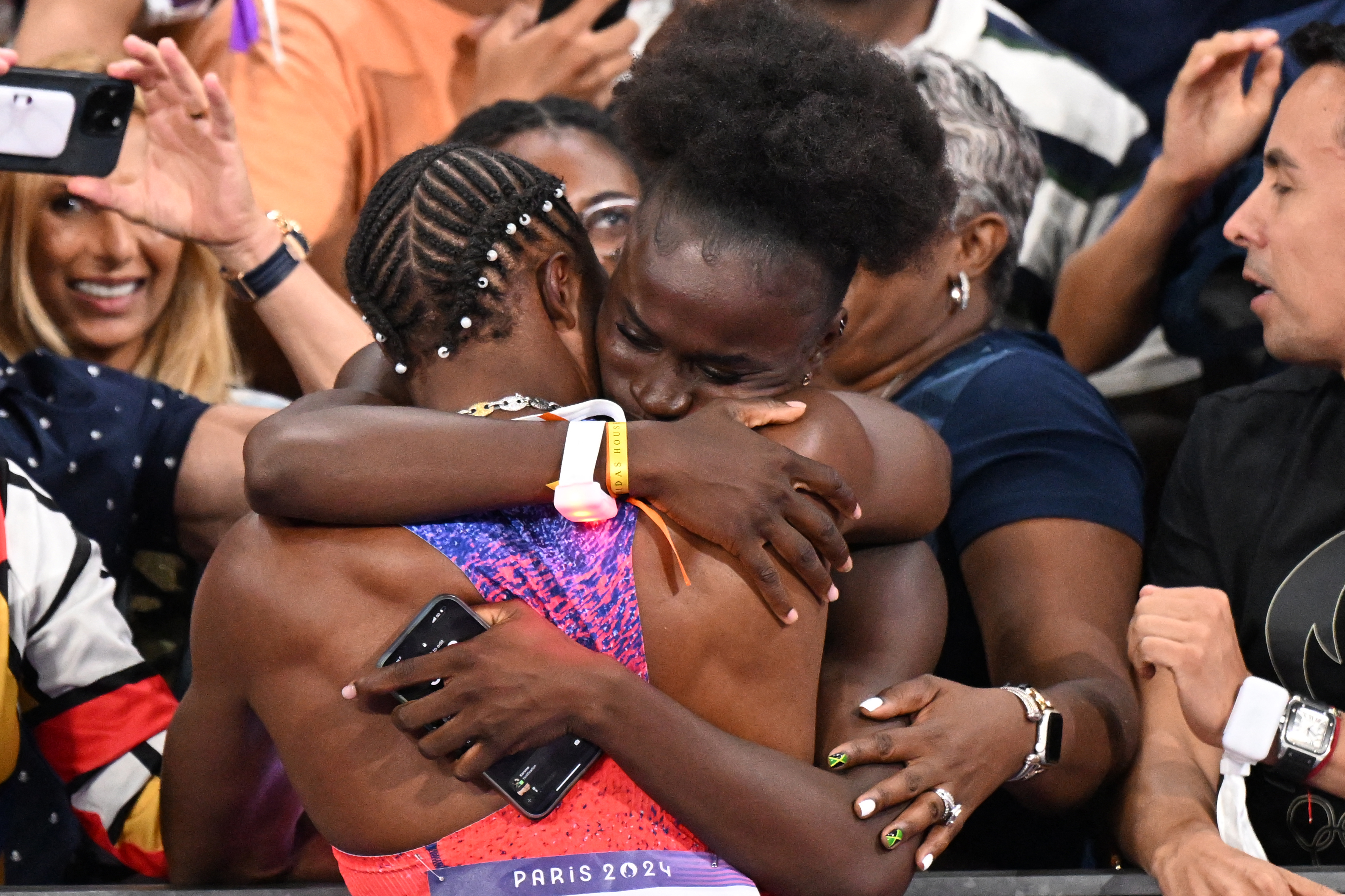 Noah Lyles celebrates with Junelle Bromfield 