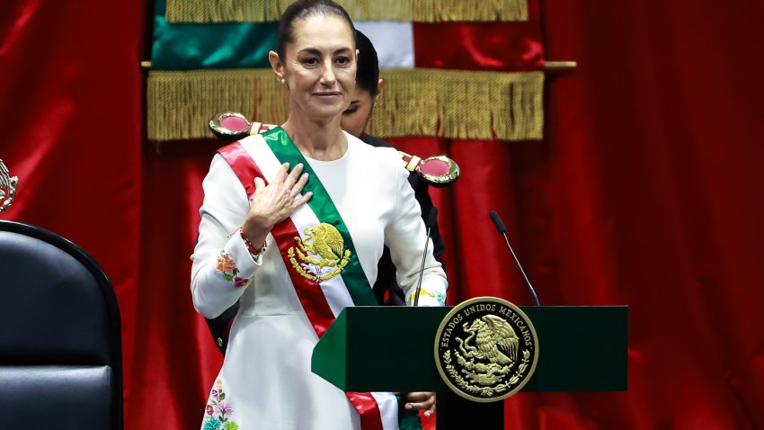 MEXICO CITY, MEXICO – OCTOBER 01: New president of Mexico Claudia Sheinbaum Pardo receives the presidential sash during the investiture ceremony as part of the presidential inauguration on October 01, 2024 in Mexico City, Mexico. Claudia Sheinbaum takes office as the first female president of Mexico following an overwhelming victory in the presidential election. (Photo by Manuel Velasquez/Getty Images)