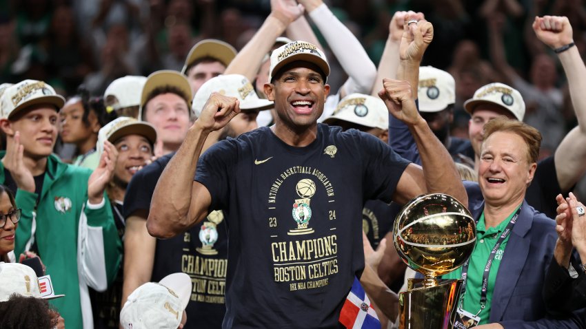 Jun 17, 2024; Boston, Massachusetts, USA; Boston Celtics center Al Horford (42) celebrates after winning the 2024 NBA Finals against the Dallas Mavericks at TD Garden. Mandatory Credit: Peter Casey-USA TODAY Sports