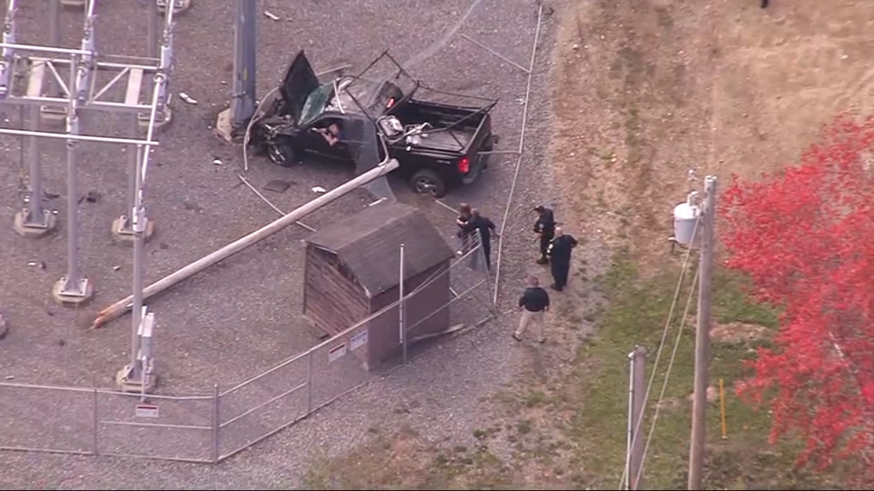 A crashed pickup truck at an electric substation in Gardner, Massachusetts, on Tuesday, Oct. 8, 2024.