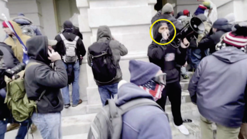 Michael St. Pierre is highlighted speaking into a megaphone outside the U.S. Capitol during the Jan. 6, 2021, riot.