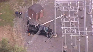 A crashed pickup truck at an electric substation in Gardner, Massachusetts, on Tuesday, Oct. 8, 2024.