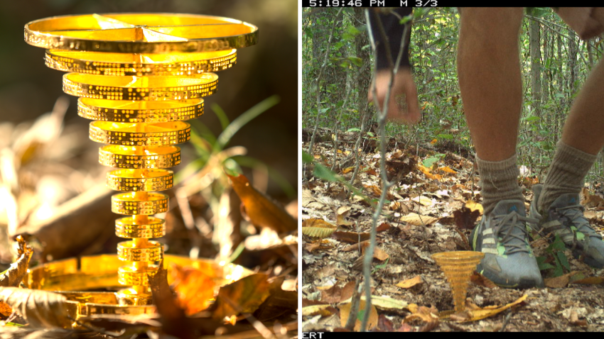 The winner claiming the gold statue (seen up close at left) at the heart of Project Skydrop's treasure hunt on Tuesday, Oct. 1, 2024, at 5:19 p.m.