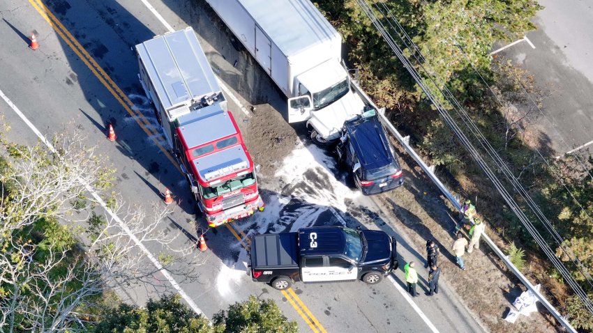 First responders at the scene of a deadly delivery truck crash on Route 6 in Wellfleet, Massachusetts, Thursday, Oct. 10, 2024.