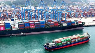 A cargo ship is sailing towards the docking of a foreign trade container terminal in Qingdao Port, Shandong province, in Qingdao, China, on June 7, 2024.