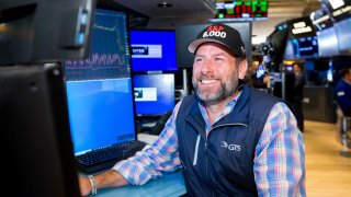 Traders work at the New York Stock Exchange (NYSE), Friday, November 8, 2024. 