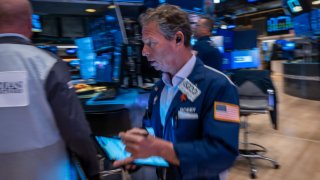 Traders work on the New York Stock Exchange (NYSE) floor on November 12, 2024 in New York City.